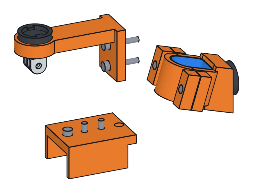 Renders of three orange printed bike mounts: an out-front computer arm with Garmin and GoPro mounts, a seatpost radar clamp, and a lamp cradle.
