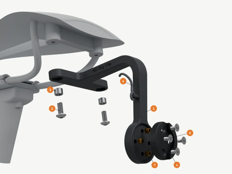 Exploded render: the arm dropped off the saddle's two holes with two steel sleeves and M5 bolts below it, the quarter-turn insert and its screws pulled back from four M3 brass inserts, numbered 1 to 7 as in the parts list.